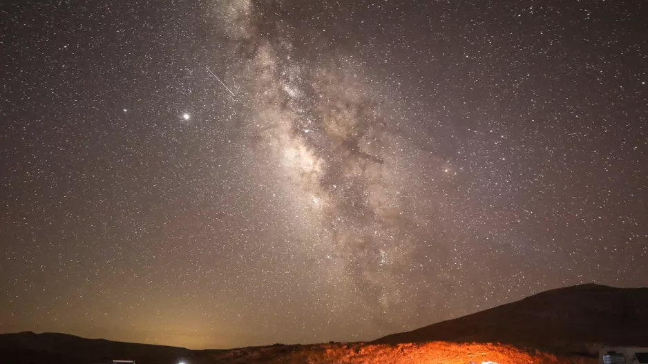 Milky Way Galaxy with Meteorite streaking above starwatchers campsite - Earth